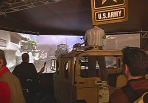 Gamers line up for their turn to practice shooting people in the America's Army booth at the 2005 Electronic Entertainment Expo.