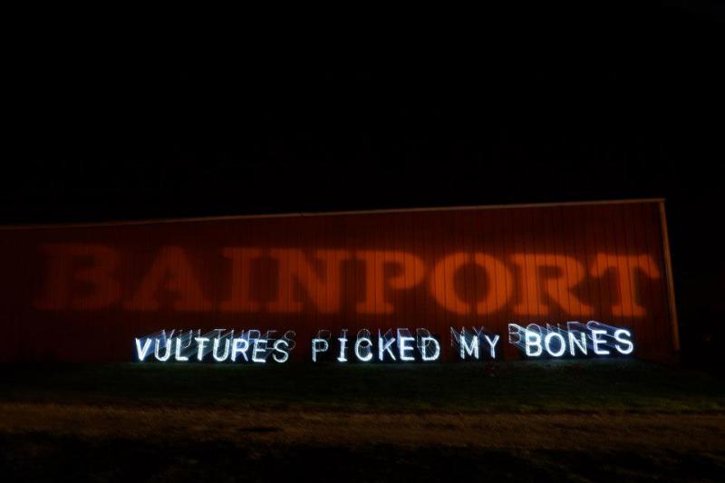lights that say "Bainport" and "vultures picked my bones"