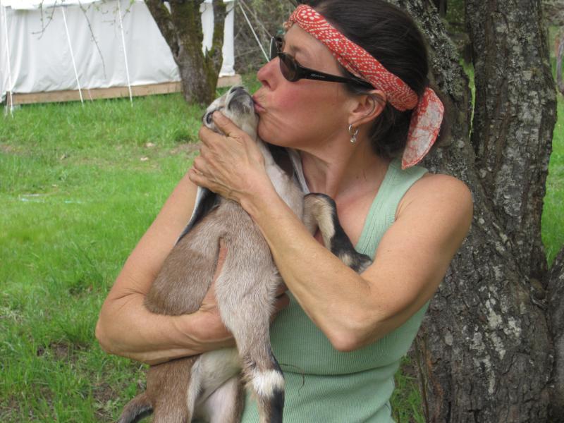 Sara Grusky with baby goat Thelma