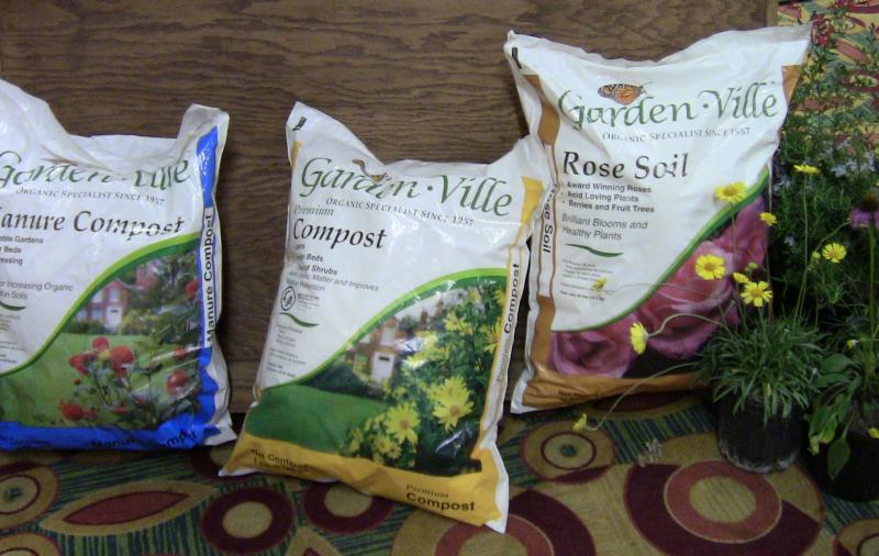 Garden Ville "compost," including sludge, on display at the conference. 