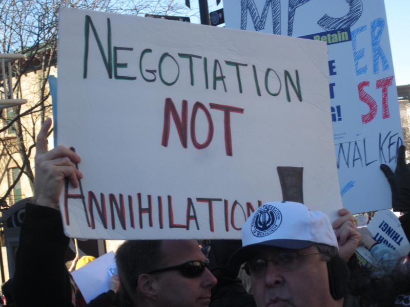 Sign that says "negotiation not annihilation"